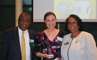 Executive Director Stacie Reimer receives the J. Franklyn Bourne Award